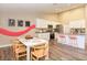 Well-equipped kitchen with stainless steel appliances, modern cabinets and a dining space nearby at 106 Oceans Cir, Daytona Beach, FL 32118