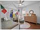 Charming bedroom featuring light fixture, area rug and natural light at 1136 W Harvard St, Orlando, FL 32804