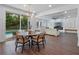 Open concept living space featuring a dining area, with sliding doors leading to a pool and backyard at 1136 W Harvard St, Orlando, FL 32804