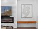 Cozy living room with modern fireplace, TV, and wood-look plank accent wall at 1136 W Harvard St, Orlando, FL 32804
