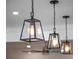 Close up of three pendant lights illuminating an interior space at 1136 W Harvard St, Orlando, FL 32804