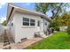 Home backyard featuring a small yard and concrete steps to back door at 1500 Pinecrest Pl, Orlando, FL 32803
