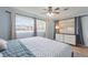 Bedroom showcasing hardwood floors, natural light, and classic color scheme at 1500 Pinecrest Pl, Orlando, FL 32803