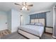 Comfortable bedroom with hardwood floors, ceiling fan, and neutral walls at 1500 Pinecrest Pl, Orlando, FL 32803