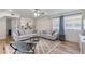 Cozy living room with comfortable seating, hardwood floors, and an open layout at 1500 Pinecrest Pl, Orlando, FL 32803