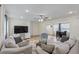 Spacious living room featuring hardwood floors, comfortable seating, and natural light at 1500 Pinecrest Pl, Orlando, FL 32803