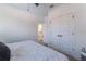 Clean bedroom showcasing neutral walls, carpeting, white bedding, and closet at 15313 Lebeau Loop, Winter Garden, FL 34787