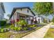Inviting single-Gathering home with attractive landscaping and a cozy front porch at 15313 Lebeau Loop, Winter Garden, FL 34787