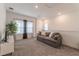 Upstairs living area featuring recessed lighting, a gray sofa, neutral walls, and plush carpet flooring at 15313 Lebeau Loop, Winter Garden, FL 34787