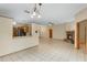 Bright living room with tile flooring, a fireplace, an open layout, and easy access to the kitchen at 2051 Pernod Ct, Apopka, FL 32703