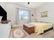 Bright bedroom with neutral tones and a window providing natural light at 2587 Cliff Way, St Cloud, FL 34771