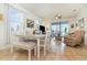 Bright dining room, view of comfortable living area and backyard at 2587 Cliff Way, St Cloud, FL 34771