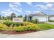 Beautiful single-Gathering home with manicured landscaping, lush lawn and brick driveway in a Palmetto community at 2587 Cliff Way, St Cloud, FL 34771