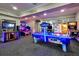 Arcade with a variety of games including air hockey, a basketball toss, and a video game arcade, for the residents of the community at 2781 Almaton Loop # 203, Kissimmee, FL 34747