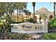 Windsor Hills Clubhouse sign with well-manicured landscaping offers community charm at 2781 Almaton Loop # 203, Kissimmee, FL 34747