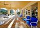 Relaxing patio seating area with ceiling fans outside of the fitness and game center at 2781 Almaton Loop # 203, Kissimmee, FL 34747