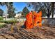A playground climbing structure made of orange panels and yellow bars invites active play at 2781 Almaton Loop # 203, Kissimmee, FL 34747
