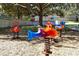 Community playground with colorful spring riders offers recreational fun for children at 2781 Almaton Loop # 203, Kissimmee, FL 34747