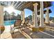 Relaxing poolside lounge chairs with a covered pergola to protect you from the sun at 2781 Almaton Loop # 203, Kissimmee, FL 34747