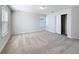 Large bedroom with carpet, and windows for light at 3273 Lilac Way, Davenport, FL 33897