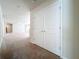 Hallway with carpeting and double doors at 3273 Lilac Way, Davenport, FL 33897
