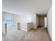 Light-filled upstairs hallway leading to bedrooms and bathrooms; neutral carpet at 3273 Lilac Way, Davenport, FL 33897