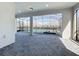 A covered lanai with brick floor, screened in opening and view of pool at 3273 Lilac Way, Davenport, FL 33897
