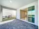 Covered patio with screened in section, brick floors and sliding door at 3273 Lilac Way, Davenport, FL 33897