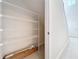 View of a storage area with multiple shelves for organization and storage space at 3273 Lilac Way, Davenport, FL 33897