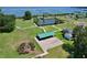 Aerial view of lakefront park with pond, pavilion and recreational facilities nearby at 383 Floral Dr, Winter Garden, FL 34787