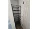 Functional closet features shelving unit, providing ample storage space at 383 Floral Dr, Winter Garden, FL 34787