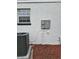 Exterior side view featuring new HVAC equipment at 383 Floral Dr, Winter Garden, FL 34787