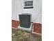 Exterior side view featuring new HVAC equipment at 383 Floral Dr, Winter Garden, FL 34787