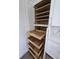 A custom pantry features pull-out wooden shelves, providing efficient storage solutions in the kitchen at 383 Floral Dr, Winter Garden, FL 34787