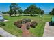 Relaxing park scene with wooden pergola and lush landscape near the waterfront at 383 Floral Dr, Winter Garden, FL 34787