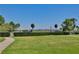 Manicured park view of lush green space, bridge and walkway that is serene and inviting at 383 Floral Dr, Winter Garden, FL 34787