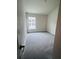 Neutral carpeted bedroom featuring bright natural light and neutral paint at 4236 Sagefield Dr., St Cloud, FL 34773