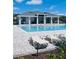 Resort-style pool with lounge chairs and a covered pavilion for relaxation and leisure at 4236 Sagefield Dr., St Cloud, FL 34773