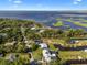 Tranquil waterfront community featuring lush landscapes, winding waterways, and convenient access to a serene lake at 4240 Lake Harney Cir, Geneva, FL 32732
