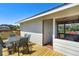 Spacious outdoor deck featuring a dining table and chairs, perfect for entertaining or enjoying the outdoors at 4240 Lake Harney Cir, Geneva, FL 32732