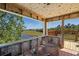 Spacious deck with beautiful views of the surrounding landscape, providing an inviting outdoor living space at 4240 Lake Harney Cir, Geneva, FL 32732