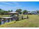 Scenic dock and waterway views complement the backyard, pool, and patio at 4240 Lake Harney Cir, Geneva, FL 32732