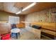 A versatile room featuring finished walls and plenty of storage, suitable for a workshop or hobby space at 4240 Lake Harney Cir, Geneva, FL 32732