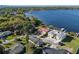 Aerial view of homes close to the lake with docks, including the property and lush landscaping at 4321 Summer Ln, Orlando, FL 32804