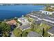 Aerial view of the property, located next to the lake with boat docks and ample parking at 4321 Summer Ln, Orlando, FL 32804