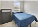 Bedroom featuring a bed, carpet floors, and natural light from a window at 4839 Jackstaff Way, Oviedo, FL 32765