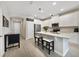 Kitchen with island, stainless appliances, and white cabinets at 4839 Jackstaff Way, Oviedo, FL 32765
