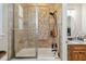 This bathroom features a tub and shower combination and a single sink vanity with granite countertops at 5200 Carson St, St Cloud, FL 34771