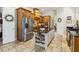 Well-equipped kitchen with stainless steel appliances and custom wood cabinetry at 5200 Carson St, St Cloud, FL 34771