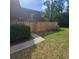 Charming townhouse featuring a private, newly fenced front yard and balcony access at 5334 Bamboo Ct # 463, Orlando, FL 32811